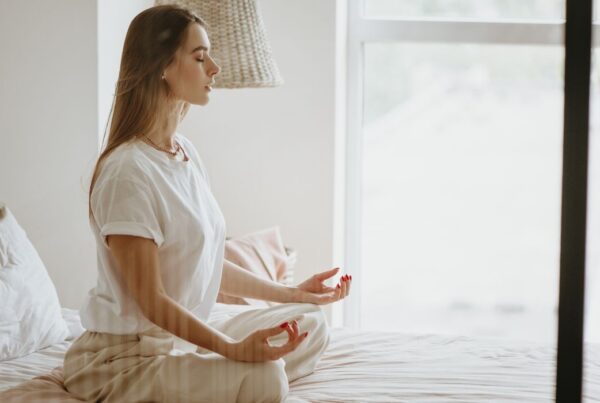 Woman meditating and reaching no-mind.